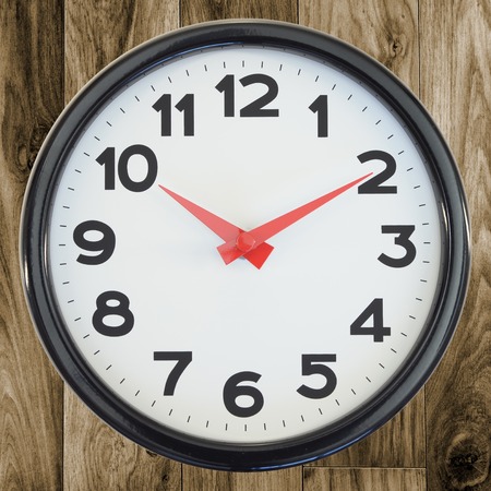 A close up shot of an analogue clockの写真素材