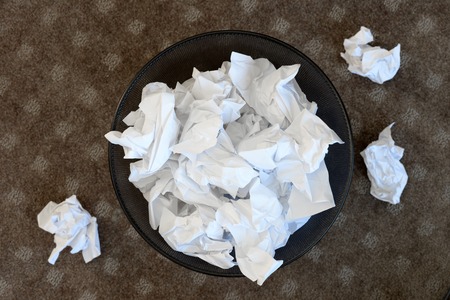 A close up shot of discarded paper rubbishの写真素材