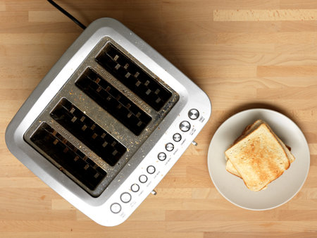 A close up shot of a kitchen toaster