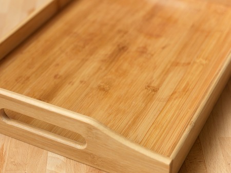 A close up shot of a wooden breakfast trayの写真素材