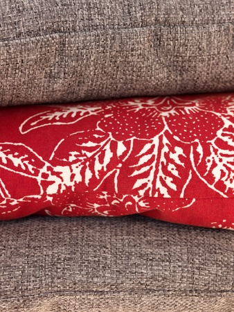 A close up shot of couch cushionsの写真素材