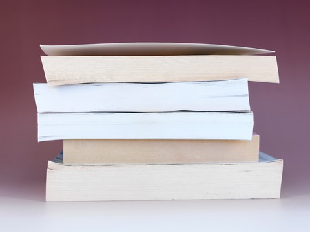 A close up shot of a pile of booksの写真素材