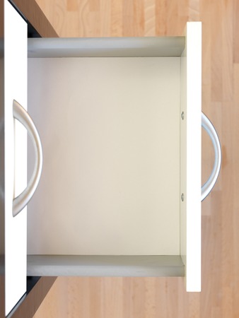 A close up shot of a set of office drawersの写真素材