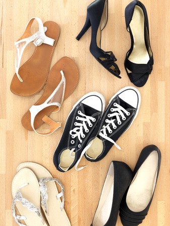 A close up shot of shoes on carpetの写真素材