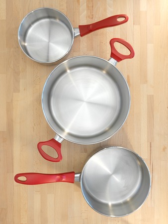 A close up shot of kitchen pots and pansの写真素材