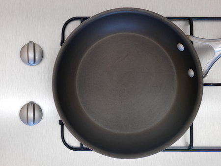 A cooking pot isolated on a stove topの写真素材