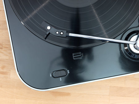 A close up shot of a record turntable