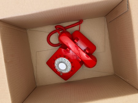 Storage boxes isolated on a wooden shelfの写真素材