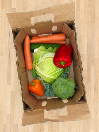 A close up shot of fruit and vegetables in a boxの写真素材
