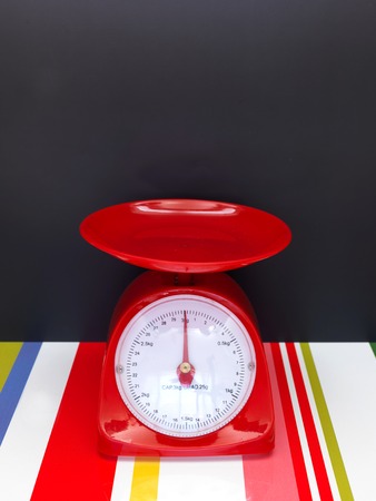 A close up shot of a set of food scalesの写真素材