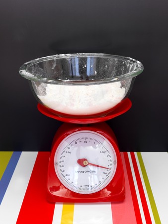 A close up shot of a set of food scalesの写真素材