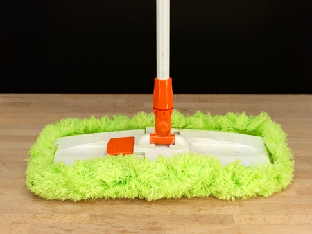 A close up shot of household floor cleaning itemsの写真素材