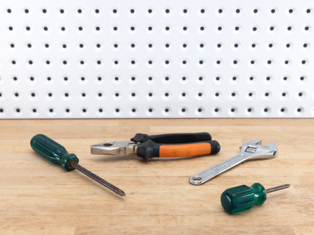 A close up shot of a workshop peg board