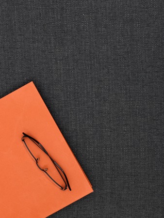 A close up shot of a pair of reading glassesの写真素材