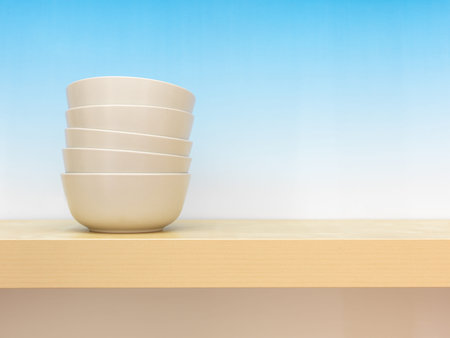 A close up photo of a wooden shelf with crockeryの写真素材