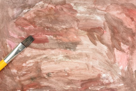 A studio photo of a paint with brushの写真素材