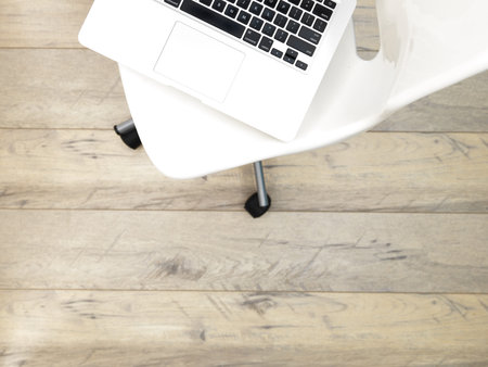 A studio photo of a white swivel chair