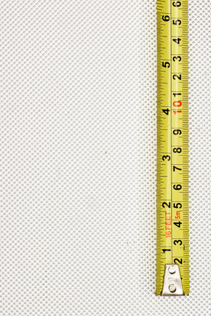 An industrial photo of a tape measureの写真素材