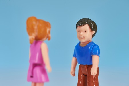 A studio photo of miniature toy peopleの写真素材