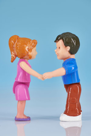A studio photo of miniature toy people