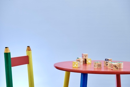 A studio photo of a childs table and chairの写真素材