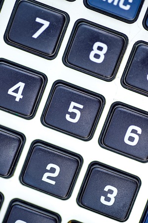 A studio photo of a business calculatorの写真素材