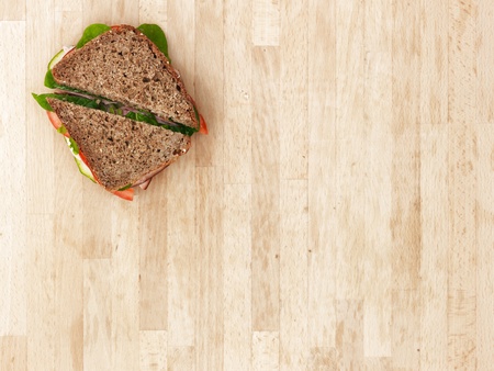 A studio photo of a sandwich at workの写真素材