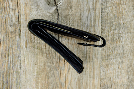 A studio photo of a mans wallets