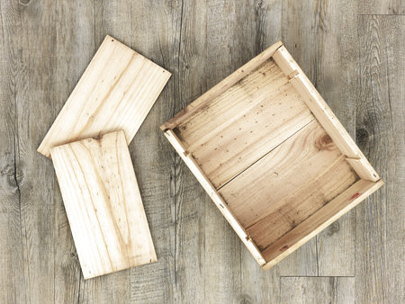 A studio photo of a old wooden box