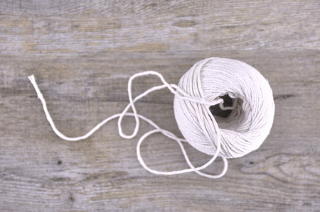 A studio photo of a ball of stringの写真素材