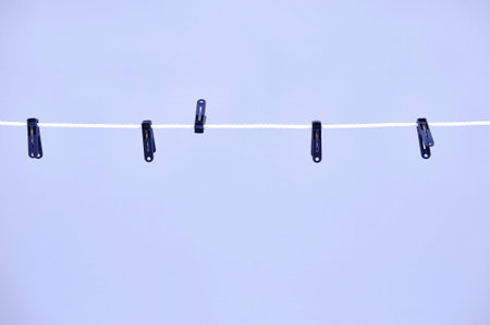 A studio photo of a clothes line