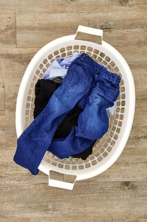 A studio photo of a laundry washing basketの写真素材