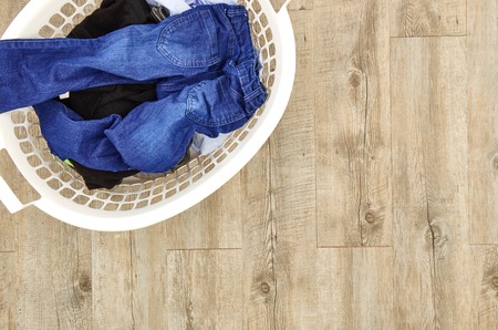 A studio photo of a laundry washing basketの写真素材