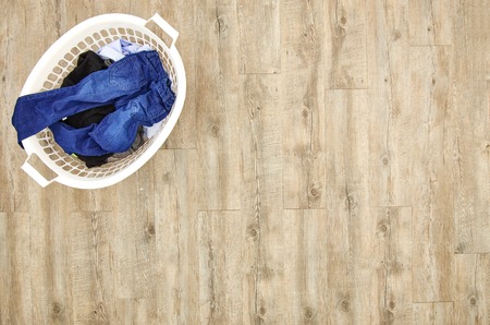 A studio photo of a laundry washing basketの写真素材