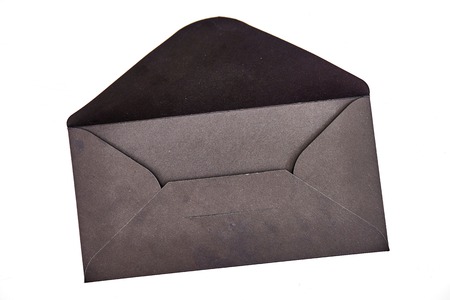 A studio photo of a black envelopeの写真素材