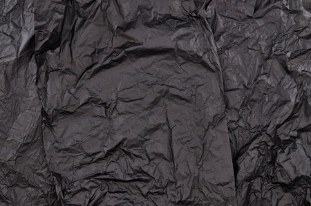 A studio photo of black wrapping paperの写真素材