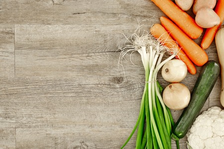 A studio photo of a fruit and vegetable boxの写真素材