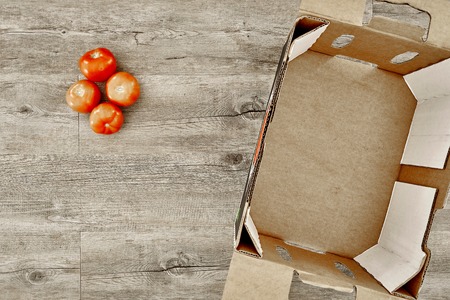 A studio photo of a fruit and vegetable boxの写真素材