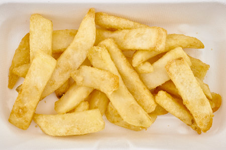 A studio photo of cooked chips