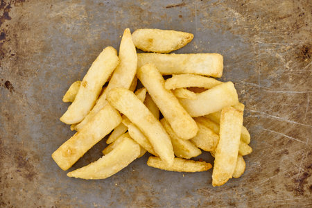 A studio photo of cooked chips