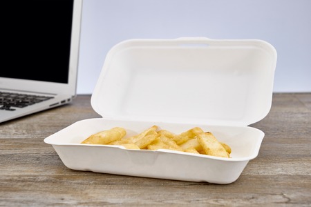 A studio photo of cooked chipsの写真素材