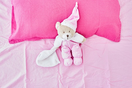 A studio photo of a pink bedroom pillowの写真素材