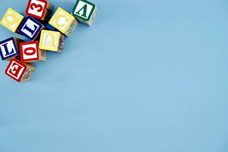 A studio photo of wooden alphabet lettersの写真素材