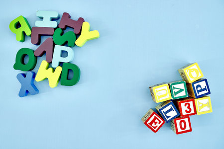 A studio photo of wooden alphabet letters
