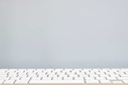 A studio photo of a wireless computer keyboardの写真素材