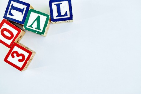 A studio photo of wooden alphabet lettersの写真素材