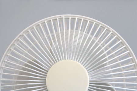 A studio photo of a portable electric fanの写真素材