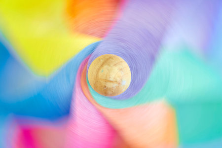 A studio photo of a spinning whirligig