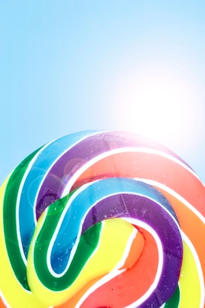 A studio photo of a candy swirl lollypopの写真素材