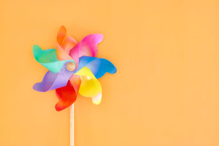 A studio photo of a spinning whirligig